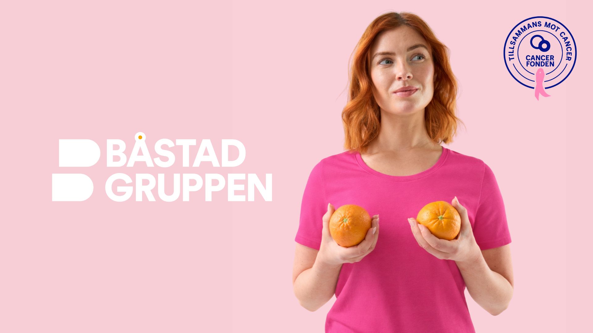 Bild på kvinna, iklädd rosa tröja, hållandes två apelsiner. Båstadgruppens och Rosa Bandets loggor