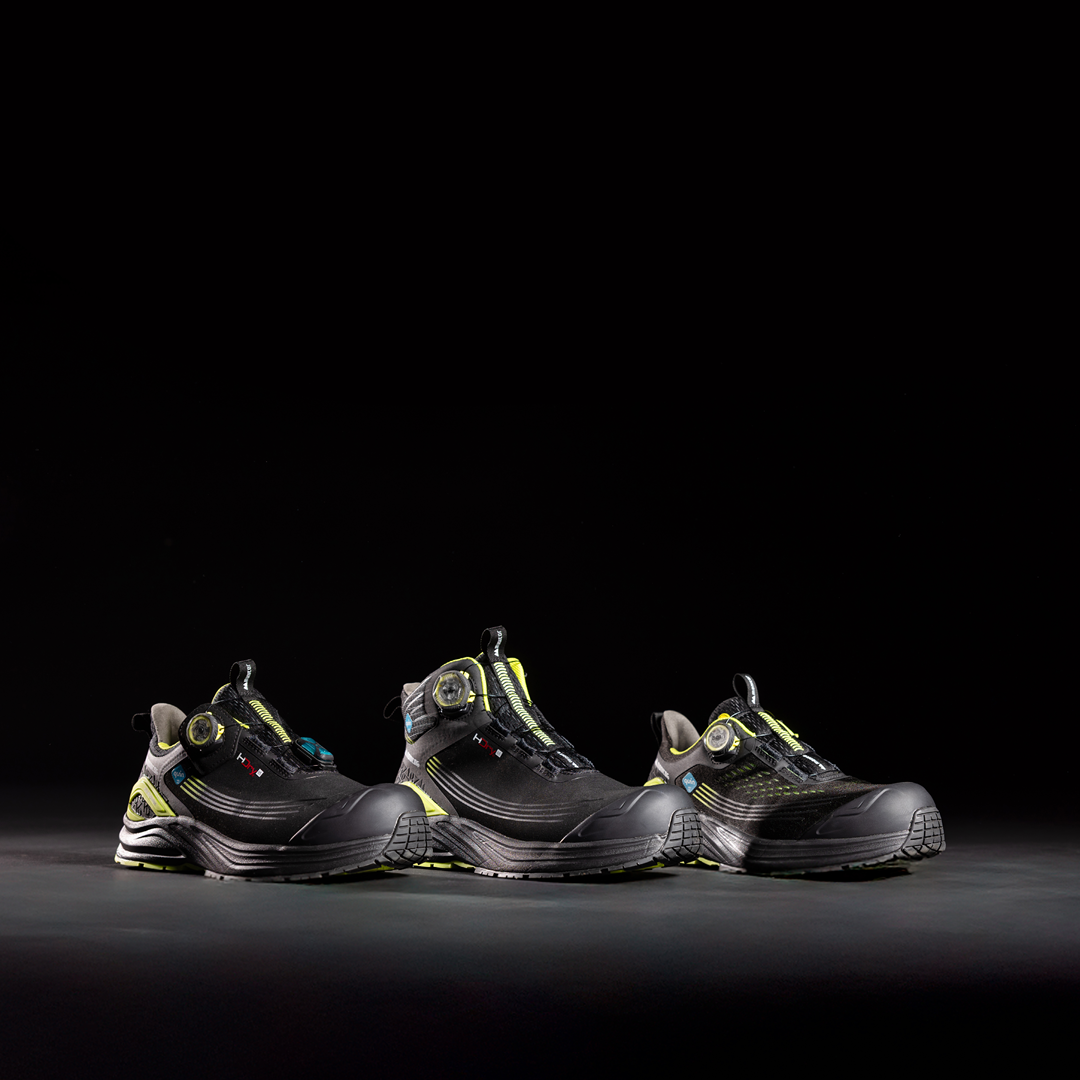 Three shoes from Monitor’s ICE Evolution series are illuminated against a dark black background. The light highlights the design and details of each model, placed side by side to showcase differences in shape and style.