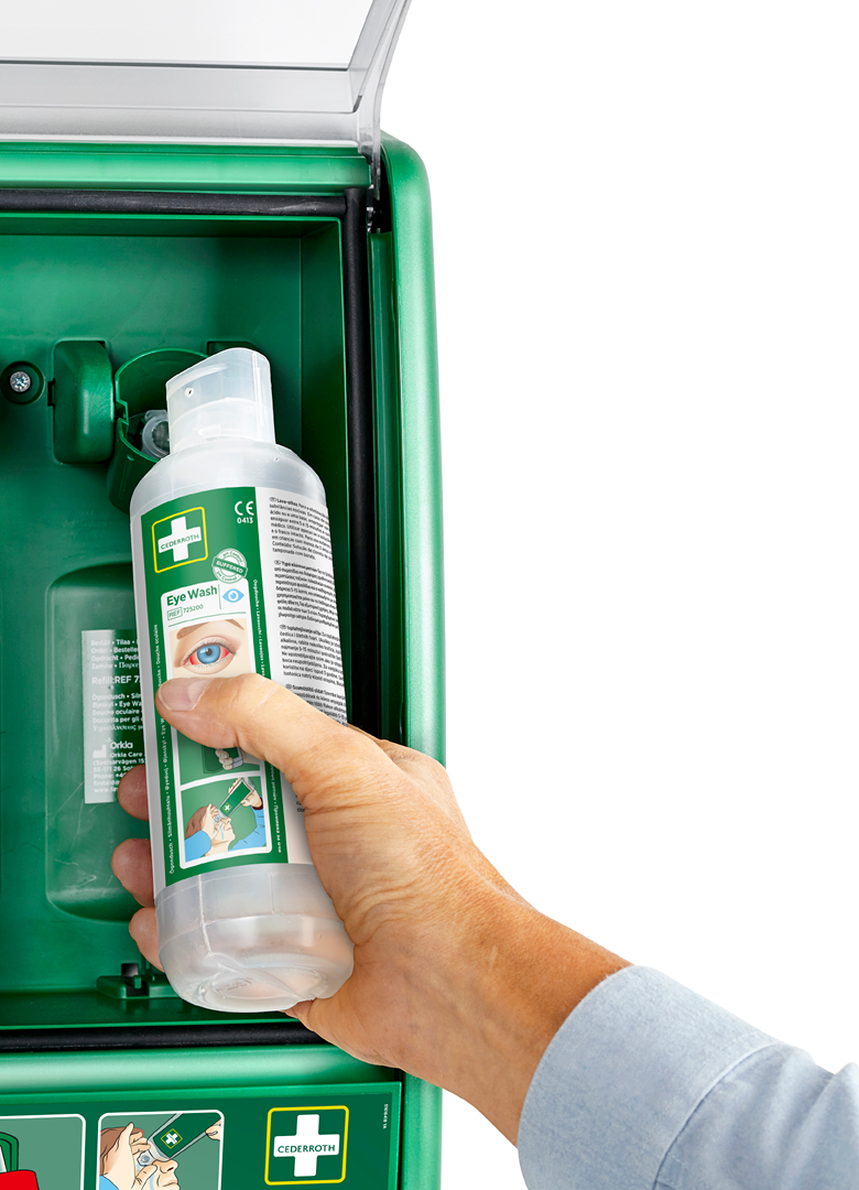 Hand filling station with eye wash