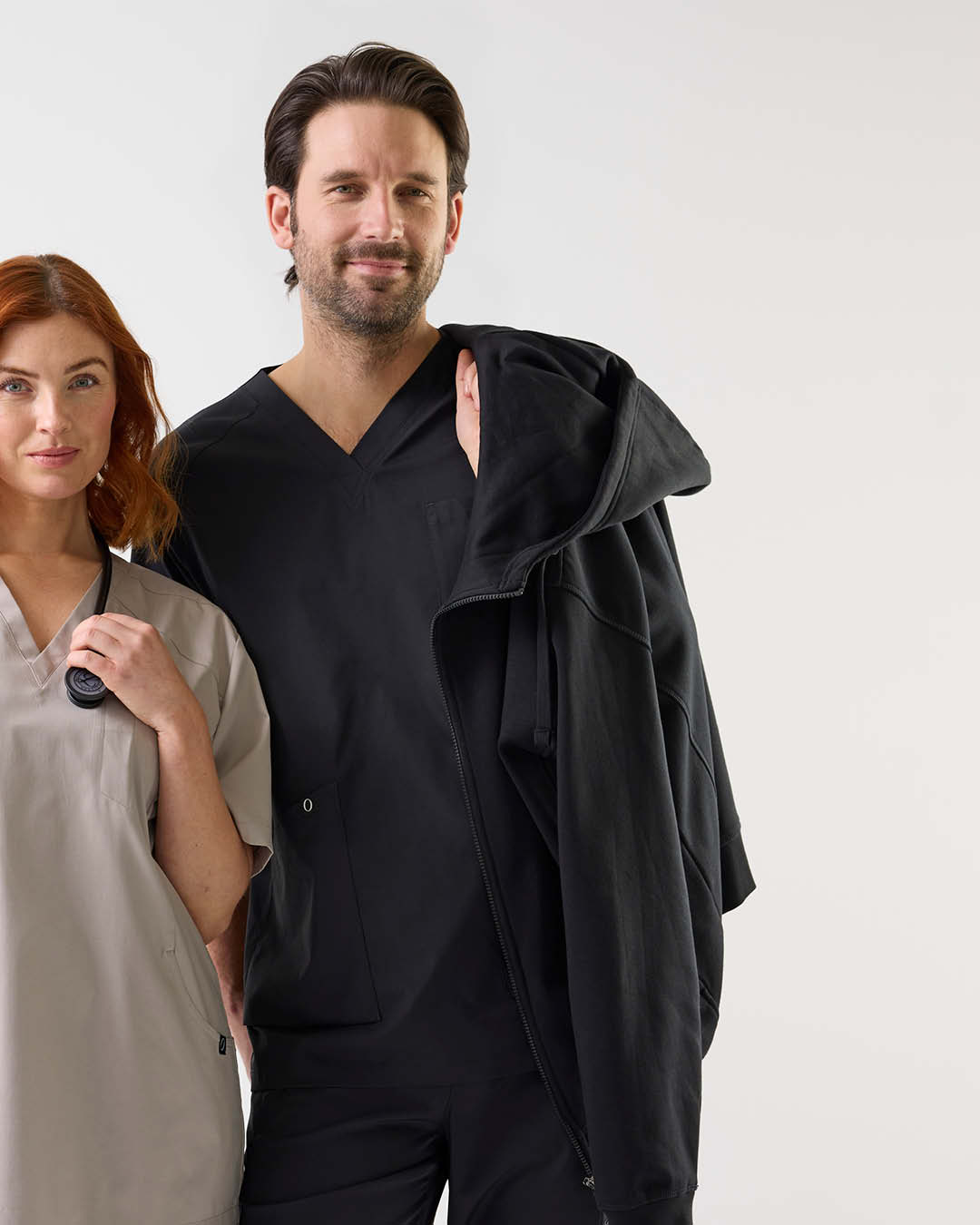 Man in black tunic and college jacket from South West – clickable link to category Other.